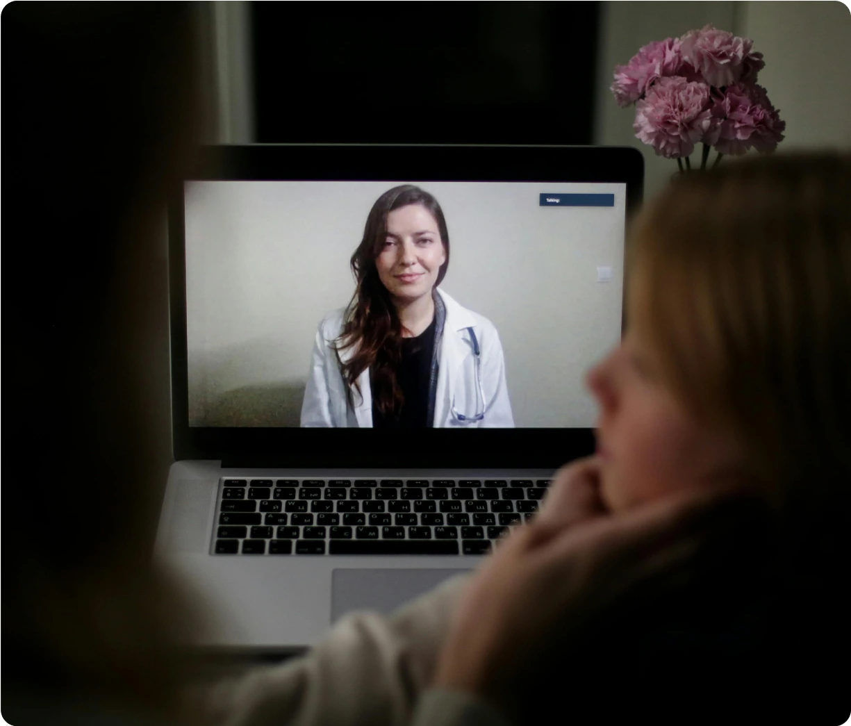 Patient consulting with doctor via video call